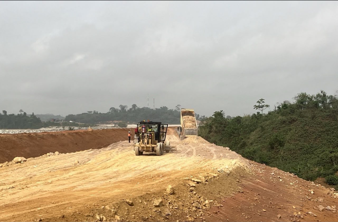 Excavator working on a road formation